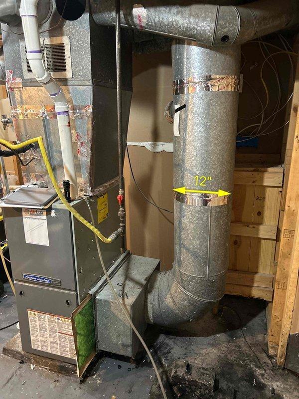 Conducted comprehensive HVAC replacement estimate for 14-year-old system with suspected refrigerant leak. Evaluated existing furnace installation in basement mechanical room, assessed galvanized ductwork configuration running through structural framing, and documented current system specifications including gas line connections and vertical/horizontal duct runs. Discussed multiple equipment options including standard forced air, ductless systems, and package units, and reviewed available financing programs to facilitate replacement of aging equipment.