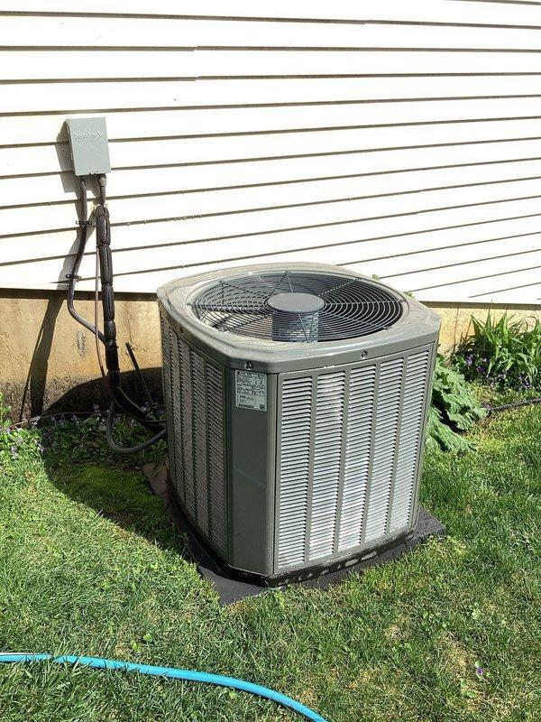 Mishawaka, IN - Completed Gold Level annual maintenance inspection on residential split system air conditioning unit. Performed comprehensive system evaluation including visual inspection of outdoor condensing unit, electrical connections, and disconnect box. Unit found in standard operating condition with normal weathering for outdoor equipment. Documented system condition with photographs for maintenance records.