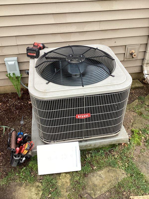 Completed planned air conditioning maintenance on Bryant system. Performed comprehensive system diagnostics including indoor/outdoor temperature readings, electrical measurements, and refrigerant pressure checks. Cleaned outdoor condenser coil to ensure optimal heat transfer efficiency. Replaced 16x25x1 air filter. Verified thermostat and carbon monoxide detector functioning properly. Measured indoor conditions at 59°F with 60% humidity and outdoor temperature at 63°F. Recorded return air temperature of 69°F and supply air temperature of 49°F, confirming proper system cooling performance. Checked contactor voltages at 240V and 120V, verified capacitor operation, and measured amp draw within manufacturer specifications. Confirmed AC system running properly with no issues identified at time of service. Noted customer interest in upgrading to app-controlled thermostat for future consideration.