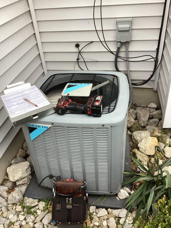 Completed annual planned maintenance on Daikin outdoor condensing unit. Performed comprehensive system inspection including electrical connections, dual-run capacitor, and CoreSense Diamontrx+ monitoring device. Replaced 410 filter, verified all wiring connections secure, and confirmed proper operation of all components. System tested and operating within normal parameters.