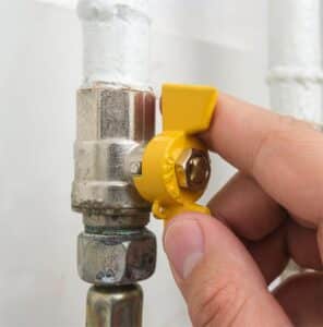 Plumber switching gas line off
