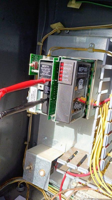 Replaced faulty MEP100 programmable controller module in the equipment control panel. Installation verified with proper connection of all wiring harnesses including the MERT4 circuit interface. Payment processed via customer's credit card on file.