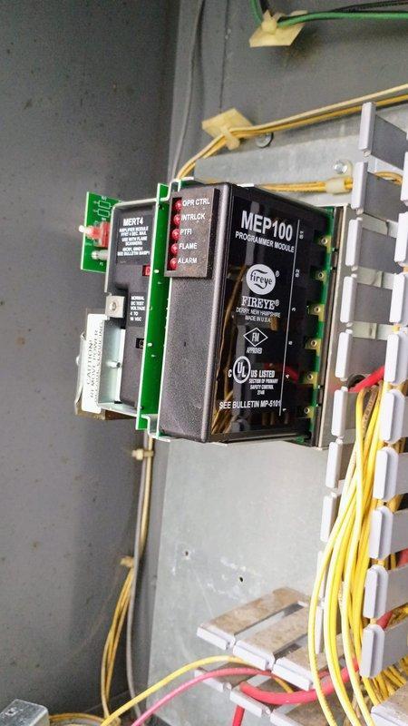 Replaced faulty MEP100 programmable controller module in the equipment control panel. Installation verified with proper connection of all wiring harnesses including the MERT4 circuit interface. Payment processed via customer's credit card on file.