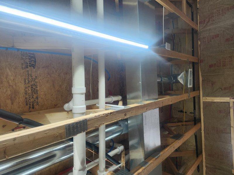 Performed inspection of main drain cleanout located in front flower bed to address customer complaint of toilet gurgling when exhaust plumbing pipe is in use. Examined PEX manifold system and drainage configuration. Confirmed issue was caused by improper venting in the main stack, creating negative pressure in the system. Cleared blockage and restored proper drainage flow, resolving the toilet gurgling problem.