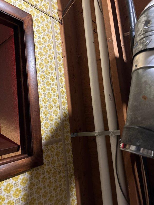 Responded to callback regarding exhaust support issues. Inspected and secured loose connection on round metal duct with metal band clamp and screws. Verified proper installation of exhaust cap to ensure adequate ventilation.