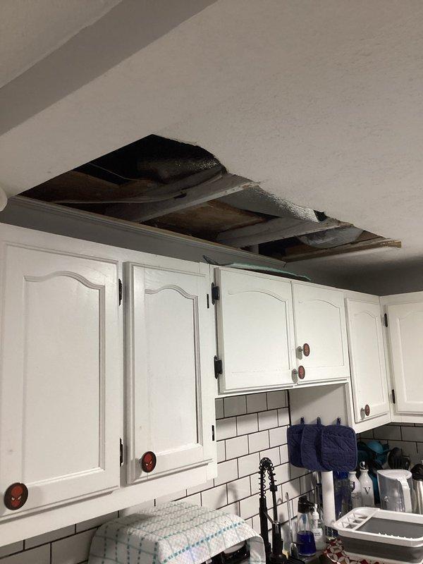 Mishawaka, IN - Responded to no heat call for 3-year-old system located in attic. Upon arrival, confirmed customer complaint of no airflow through vents. Discovered significant water damage to ceiling in kitchen area directly below unit. Inspection revealed condensate drain line blockage causing water overflow and subsequent ceiling damage. Cleared drain line, verified proper system operation, and advised customer on necessary ceiling repairs.