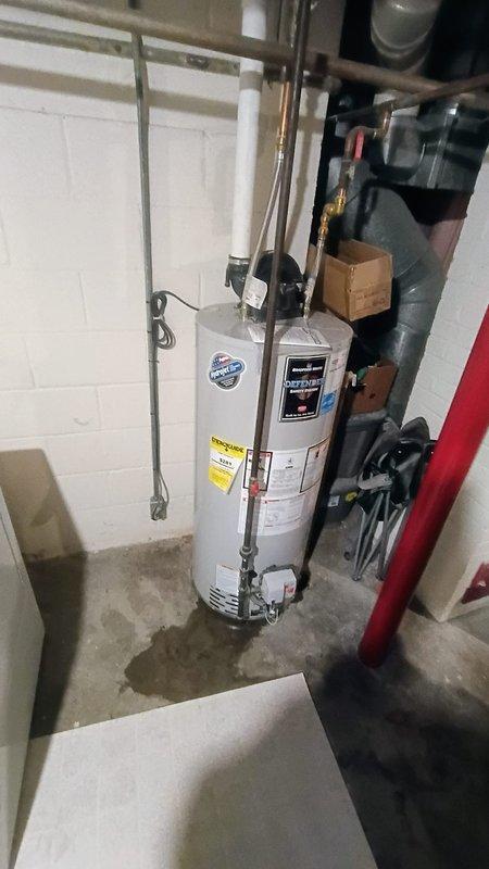 Responded to first call service request for a 4-year-old water heater exhibiting leakage at the bottom. Upon inspection of the tanked water heater in the basement utility room, identified the source of the leak and completed necessary repairs to resolve the issue while maintaining proper connection to existing copper and PVC piping infrastructure.
