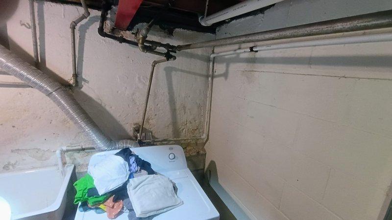 Successfully completed replacement of a residential tanked water heater as quoted. Installed new unit with proper copper pipe connections for hot and cold water lines, ensuring all fittings were secure and leak-free. System is now operational with appropriate drainage setup in the basement utility area.