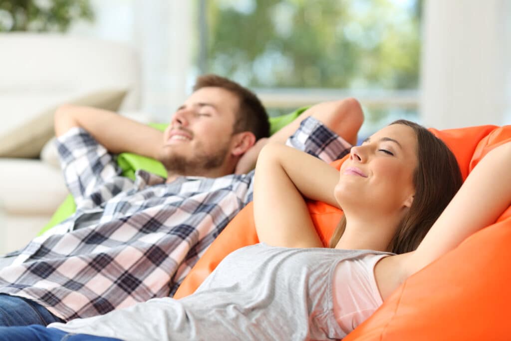 roommates relaxing at home with clean air