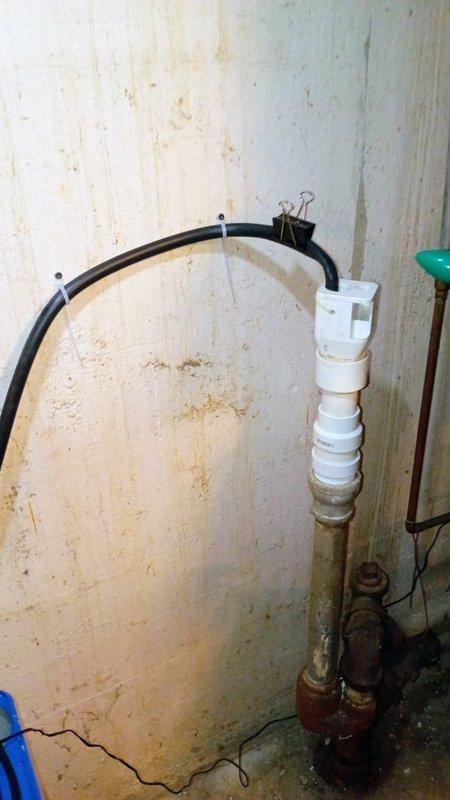 Niles, MI - Responded to service call for water softener system not functioning properly. Discovered brine tank was full and system was bypassed. Identified kinked drain line preventing proper venturi formation. Resolved issue by anchoring drain line to wall and cycling system through all settings to verify proper operation.