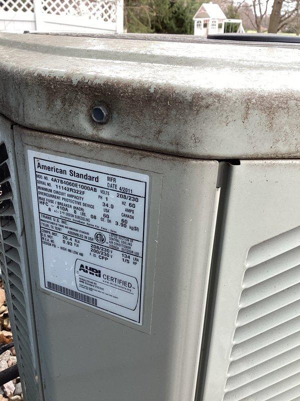 Completed scheduled air conditioning maintenance on American Standard heat pump system (Model 7A6006B1000AB, manufactured April 2011). Performed comprehensive inspection of outdoor unit, noting accumulation of dirt and debris on top casing and between condenser coil fins. Cleaned condenser coils to remove buildup affecting heat transfer efficiency. Replaced 410 filter per membership maintenance agreement. Verified unit specifications and confirmed system operational status. All routine maintenance tasks completed per planned maintenance protocol.