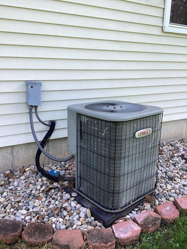 Mishawaka, IN - Completed comprehensive HVAC tune-up and inspection on residential Lennox air conditioning unit as part of promotional maintenance service. Performed full system evaluation including electrical connections at disconnect box, refrigerant levels, condenser coil inspection, and operational testing to ensure optimal performance for the cooling season.