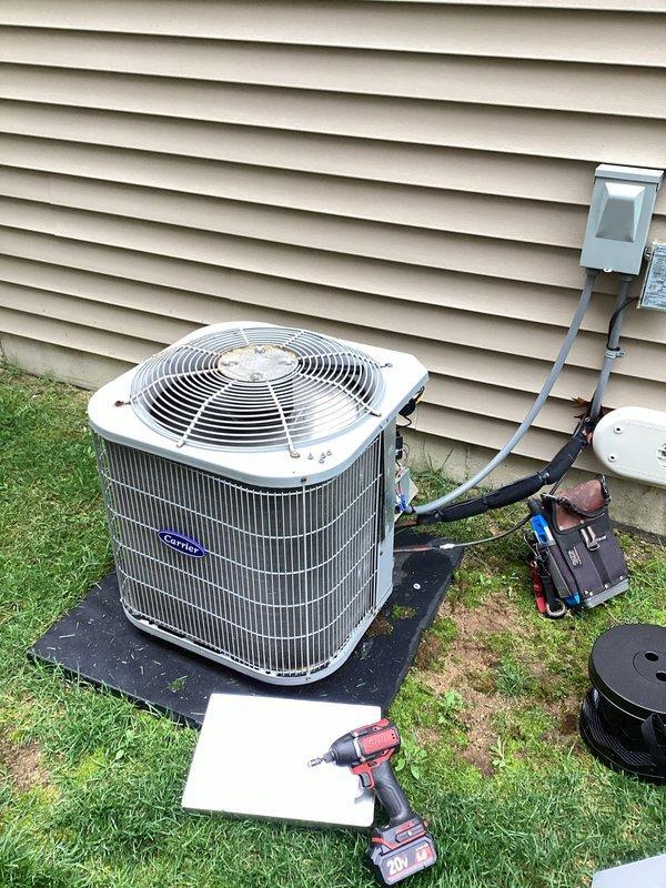 Mishawaka, IN - Completed scheduled air conditioning maintenance on outdoor condensing unit as part of membership plan. Performed comprehensive system inspection including electrical connections at disconnect box, refrigerant line examination, condenser coil assessment, and fan operation verification. All components found operating within normal parameters and unit returned to service.