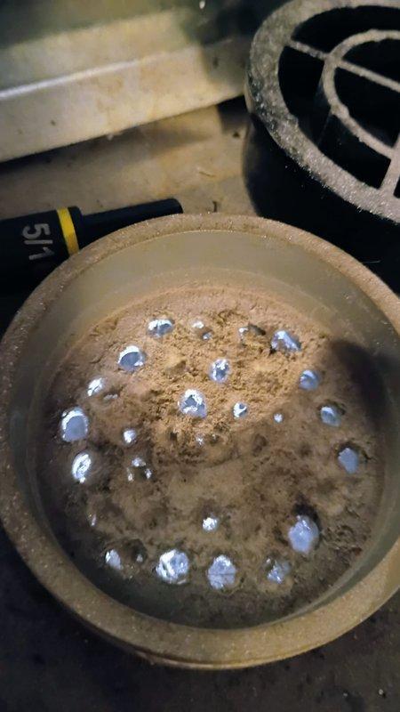 South Bend, IN - Responded to callback for system blowing cold air following maintenance visit. Upon inspection, found burner assembly with heavy accumulation of dust and debris throughout chamber and on burner jets, which was affecting proper ignition and heat delivery. Cleaned burner assembly, verified proper ignition sequence, and confirmed system now heating properly before departure.