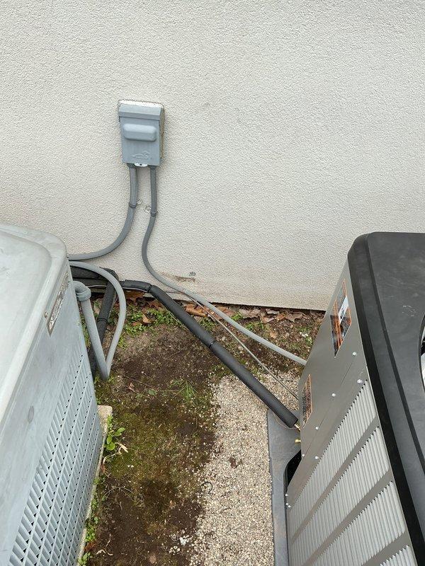 Successfully completed installation of new Lennox EL22KCV-36 air conditioning system with CK40CT-36B cased coil. Positioned outdoor condensing unit on concrete pad against exterior wall, installed weatherproof electrical disconnect box with proper conduit routing, and verified all electrical connections meet code requirements. System tested and confirmed operational with proper airflow and cooling performance.