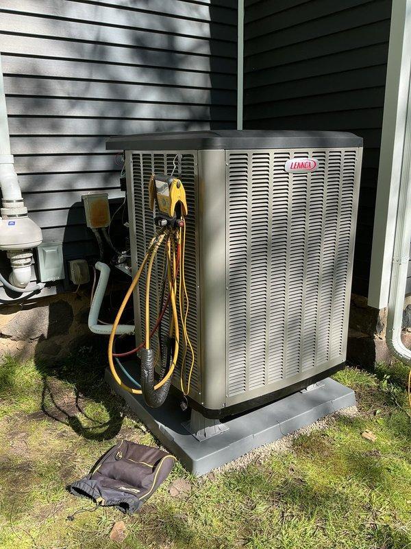 Completed full dual fuel HVAC system installation including Lennox EL297UH070XV36B high-efficiency furnace, EL21KLV-036 heat pump unit, and CK40CT-36B cased evaporator coil. Installed TH6320WF2003 Wi-Fi thermostat programmed for dual fuel operation to optimize heating efficiency between electric and gas sources. Mounted heat pump condenser on 40x40x3 composite pad with proper leveling and clearances. Added 1610 media air cleaner to ductwork for enhanced indoor air quality. Ran and insulated refrigerant lines between indoor and outdoor units, evacuated system, and charged to manufacturer specifications. Installed PVC condensate drain lines and venting per code requirements. Verified all electrical connections, tested system operation in both heating and cooling modes, confirmed proper airflow across coil, and ensured seamless switchover between heat pump and furnace stages based on outdoor temperature thresholds.