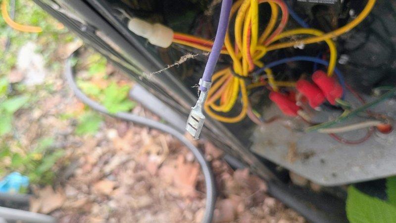 Responded to no-cool call on American Standard unit (Model 4A7A40241, manufactured 11/2019). Upon arrival, found indoor temperature at 70°F with thermostat set to 65°F, fan running but inadequate cooling. Inspected outdoor condensing unit and discovered severely damaged low-voltage control wiring with exposed and frayed copper conductors on purple wire, compromising compressor circuit operation. Damaged wire insulation appeared to be result of environmental exposure or possible animal activity. Repaired compromised control wiring, restored proper electrical connections, and verified system operation with compressor engaging properly and airflow restored through vents.