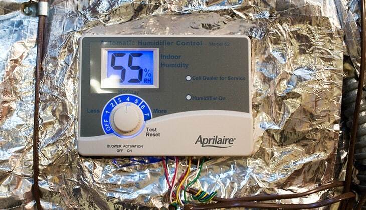 Thermostat setting for whole-home dehumidifier