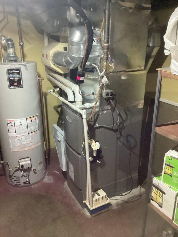 Successfully installed a new Lennox ML196 furnace with T4 thermostat in customer's utility room. Integrated system with existing filter cabinet and properly connected all ductwork, ventilation components, and electrical connections. System was tested and verified to be functioning according to manufacturer specifications.