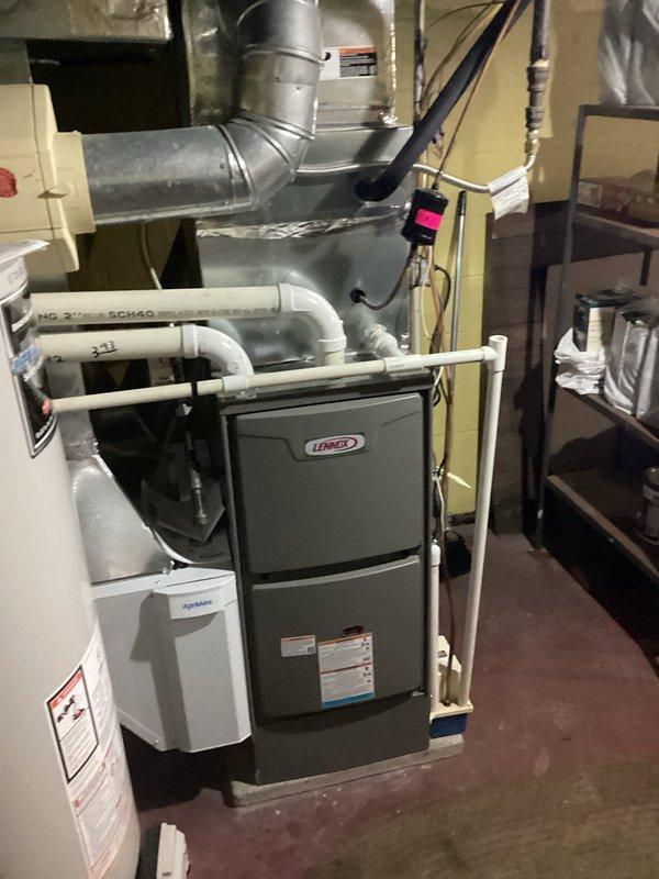 Successfully installed a new Lennox ML196 furnace with T4 thermostat in customer's utility room. Integrated system with existing filter cabinet and properly connected all ductwork, ventilation components, and electrical connections. System was tested and verified to be functioning according to manufacturer specifications.