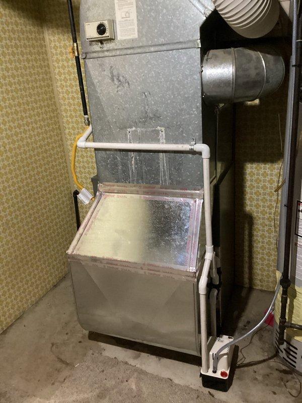 Successfully installed a Lennox ML196 Furnace with T4 Thermostat and 1" Filter Elbow in basement utility room. Redid condensate drain for evaporator coil and installed 2" PVC piping. System is operational with proper connections to existing ductwork.