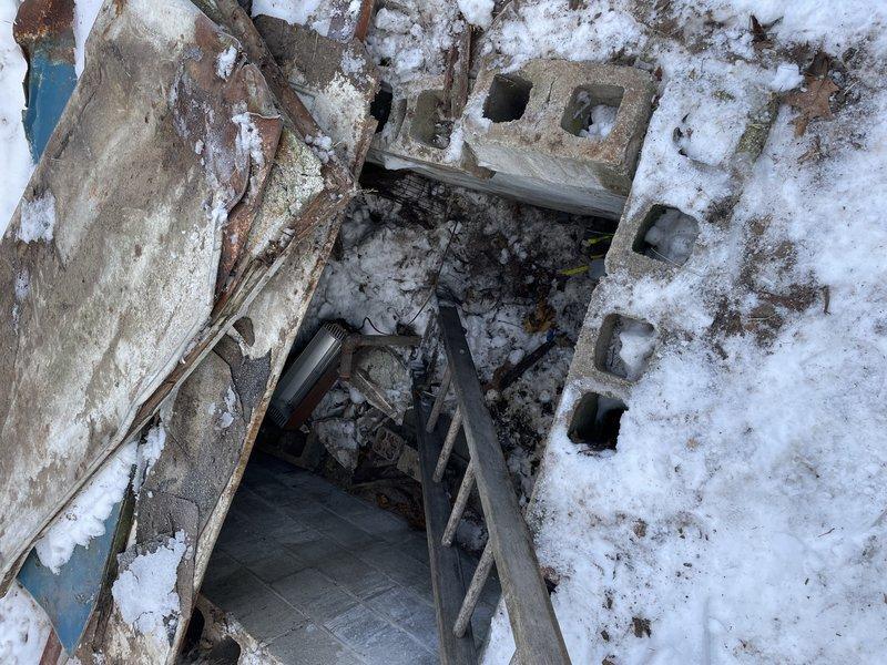 Responded to service call for disconnected water pipe. Located exposed pipe protruding from ground near cabin that required capping following cabin relocation. Discovered interconnected water supply between main residence and cabin, requiring water shutoff to both structures. Successfully capped exposed pipe to prevent potential leakage and restore water service.