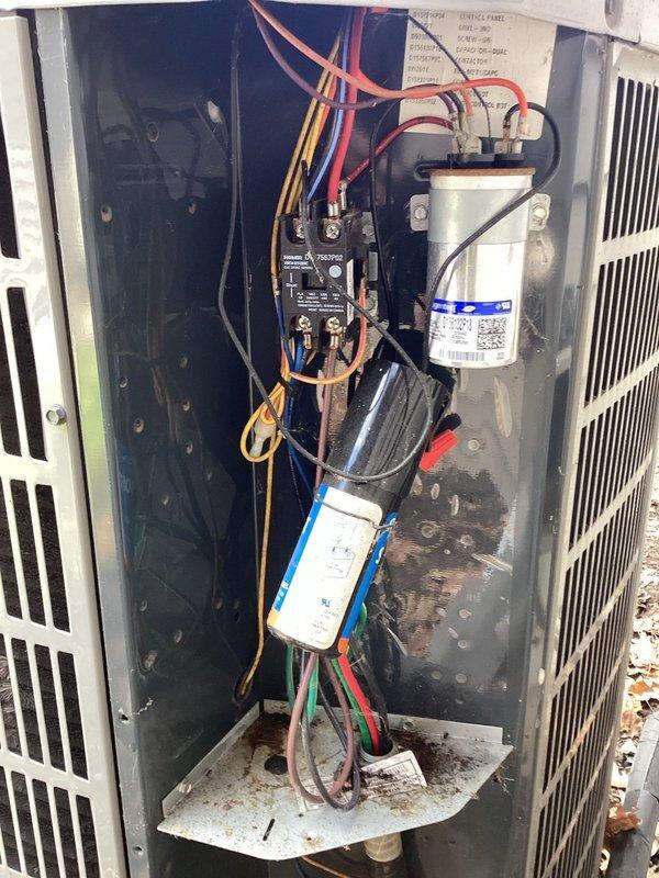 Completed annual maintenance on outdoor AC unit including inspection of electrical components. Replaced 410 filter and installed #35 humidifier pad. Unit appears to be in good working condition with no visible issues detected.