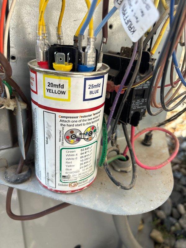 Union, MI - Completed scheduled A/C maintenance per HVAC membership plan. Performed comprehensive system inspection including electrical components, capacitor testing, and wiring verification. Documented capacitor specifications showing dual-rated 20mfd and 25mfd capacity with proper color-coded wire connections (yellow, blue, brown, red, black, and green) to compressor protector and hard start components. All electrical connections, contactors, and relay components found secure and functioning within normal parameters. System operational upon completion.