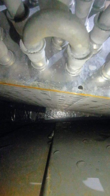 Responded to no-cool condition on 8-year-old system caused by drain pan safety switch activation. Found condensate drain pan nearly overflowing due to clogged primary drain line. Cleared blockage from condensate drain system, verified proper drainage flow, and tested safety float switch operation. System restored to normal cooling operation with condensate properly draining and all safety devices functioning correctly.